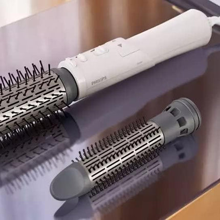 مصفف شعر فيليبس 7000 سيريز، فرشاة حرارية دوارة لتصفيف الشعر بكثافة ودقة أكبر، ملحقان، 1000 واط، أبيض/رمادي - BHA710/13